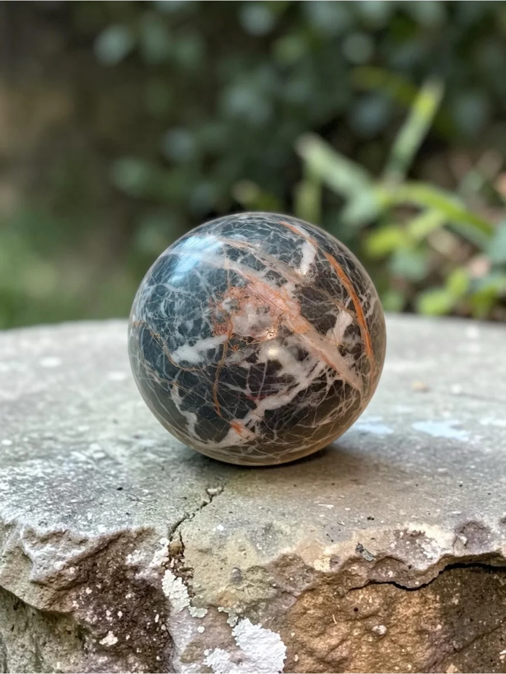 Zebra Jasper Crystal Sphere black and white with orange veining
